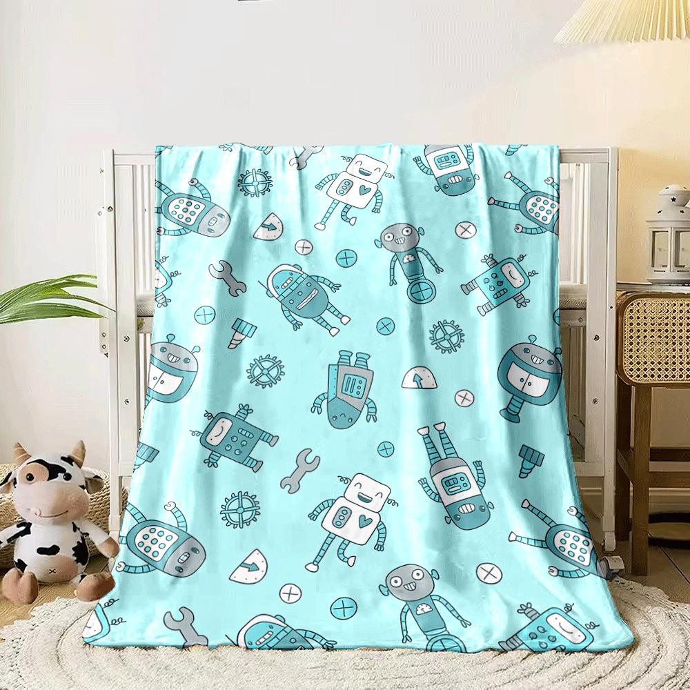 Playful robot illustrations scattered on a light blue background. for all seasons blanket lunch break throw gift 80cm x 120cm