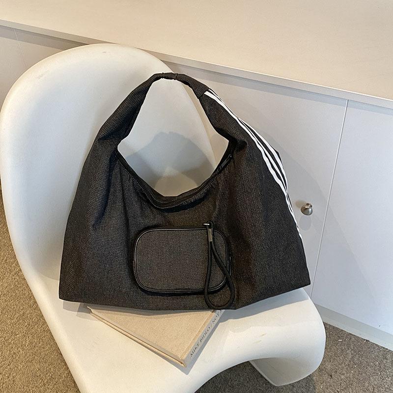 

Корейская версия модной женской сумки-тоут 2024 года, летняя простая повседневная сумка через плечо, красивая женская сумка с нишевым дизайном чёрный