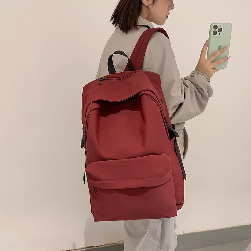 Einfacher einfarbiger vielseitiger Rucksack trendige Mode hoher Wert Campus-Stil Rucksack große Kapazität Studentenrucksack