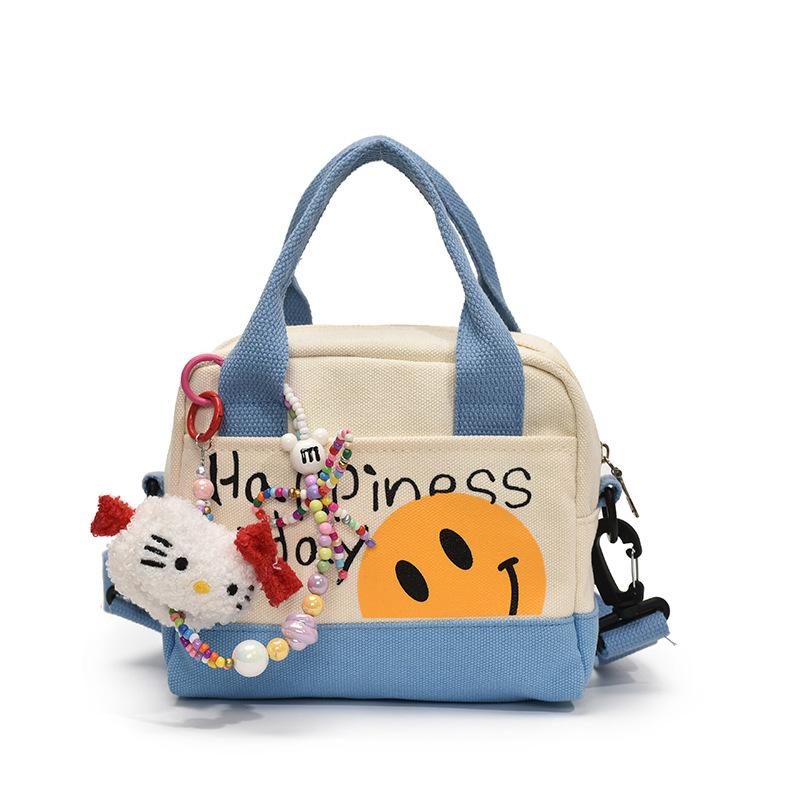 Cute Smiley Girl Handbag Hand Carry Out High Value Canvas Bag Korean Version Printed Trend Shoulder Messenger Bag