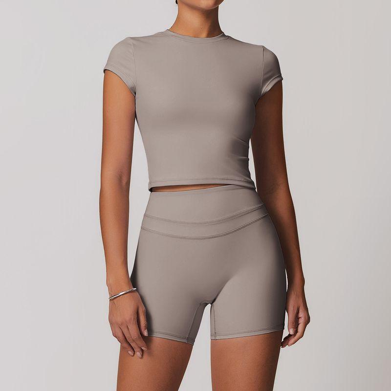 Guangzhou Zechuang Clothing Co., Ltd. Brushed Tight Back Yoga Suit Stretch High Waist Workout Clothes for Women Running