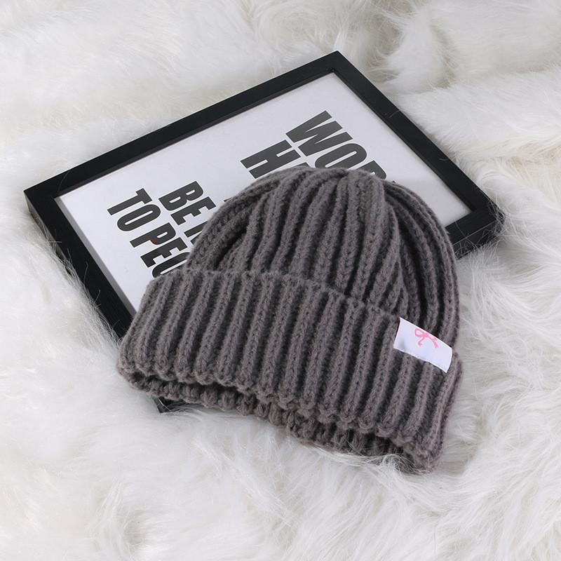 Soft And Comfortable Knitted Acrylic Hat For Women With Cute Bow Perfect For Winter And Autumn Fashion