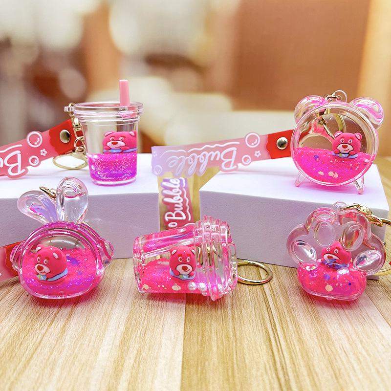 Strawberry Bear Doll Keychain with Colorful Oil-Filled Bottle and Milk Tea Cup Pendant