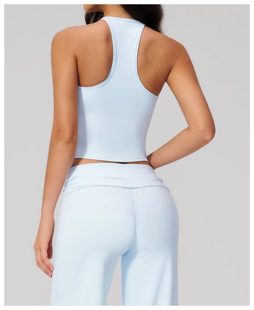 Introducing the Stylish Women's Quick-Dry Yoga Tank Top: Beautiful Design, Perfect for Fitness & Sports.