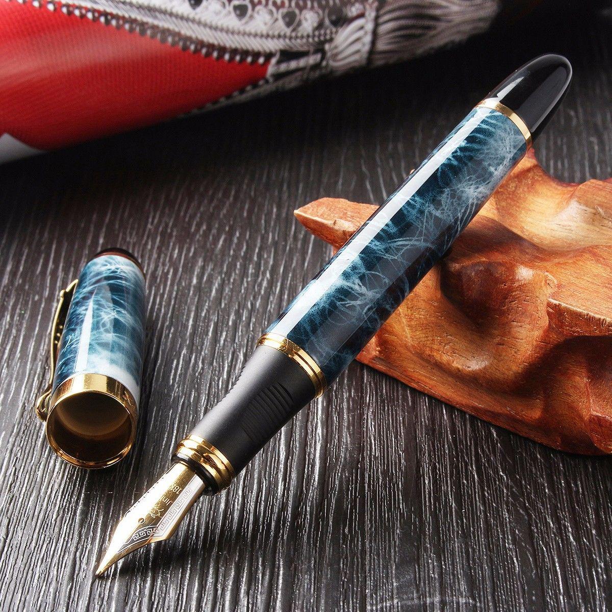 

Нова авторучка JINHAO X450 з мармуром із середнім тонким пером із золотим оздобленням.