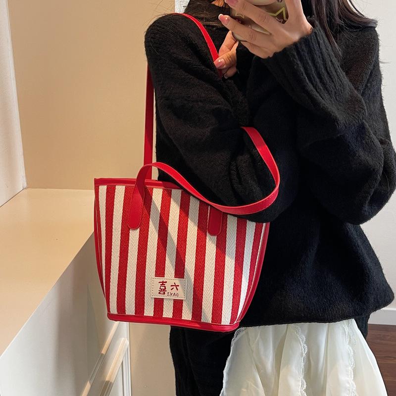 2025 summer new striped large-capacity fashion Korean version handbag personalized ins shoulder underarm bag tote bag