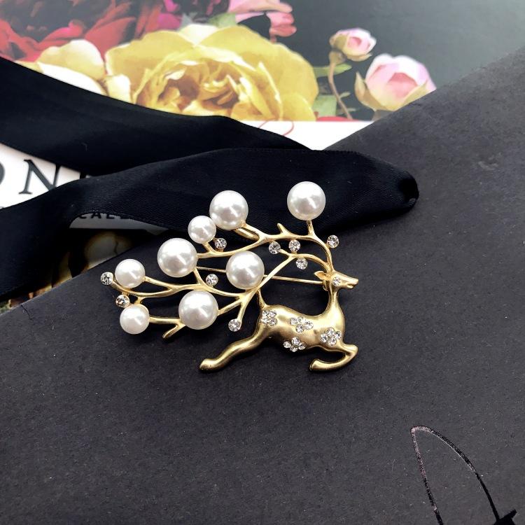 Fashion temperament dumb gold brooch corsage women's suit jacket sweater coat pin crystal high-end accessories