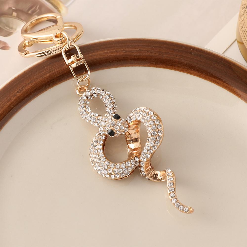 

Zodiac Series Metal Diamond Animal Snake Keychain Pendant Exquisite Bag Pendant Small Gift белый