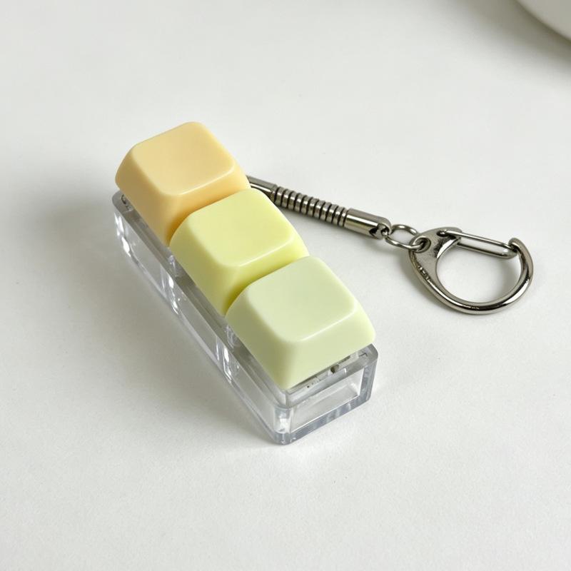 Sleutelhanger voor stressverlichting: Decompressie Kubus met Vier Knoppen & Toetsenbord Hanger