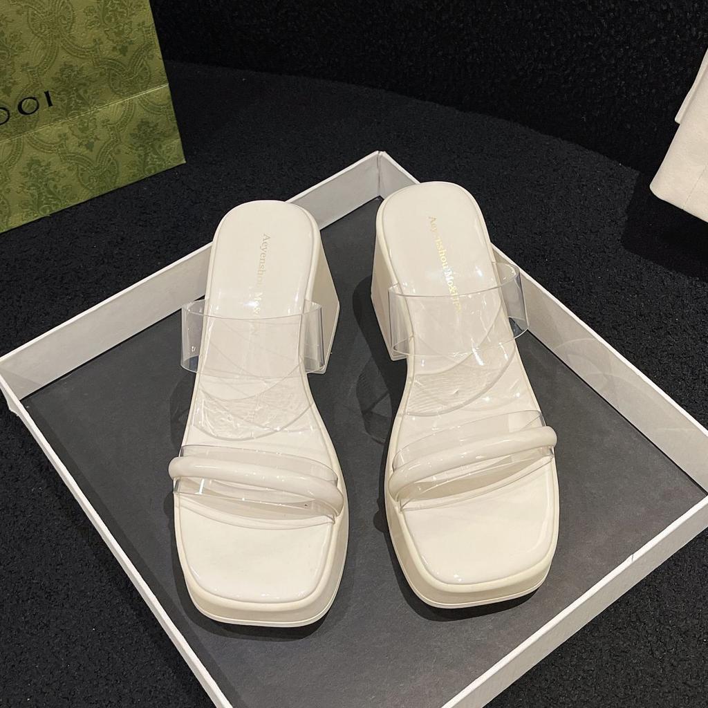 Open-toed thick-soled cool slippers for women's summer wear transparent muffin one-word drag 2025 new super medium-heeled thick-heeled sandals