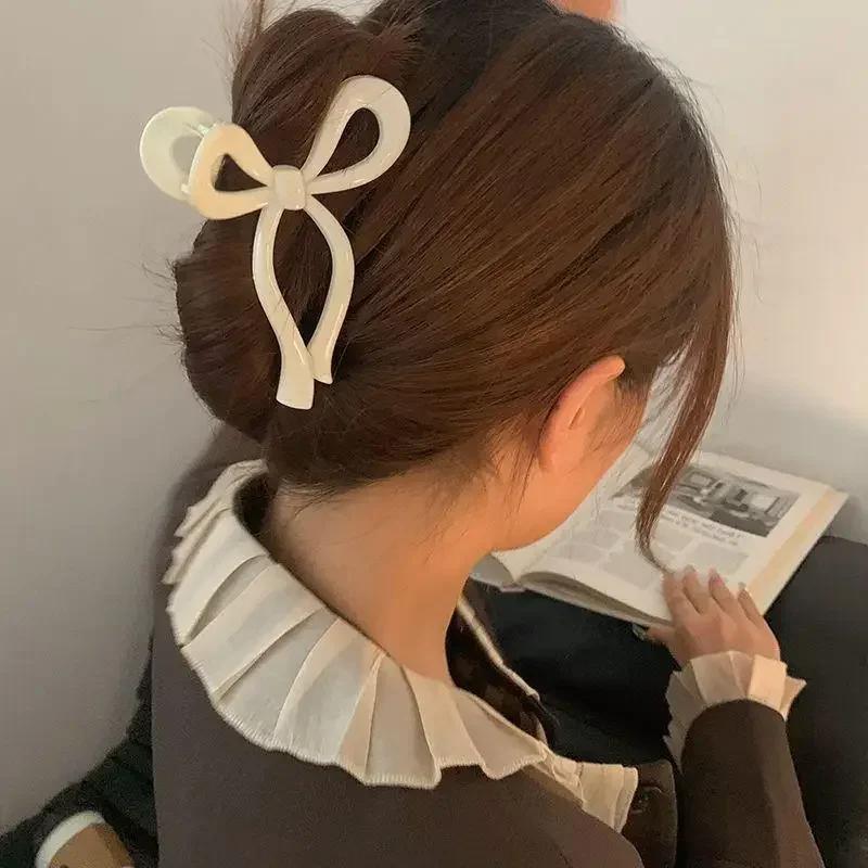 Acryl-Haarspange mit Schleife in Bonbonfarbe für Damen, durchsichtige Haarklammer mit Haifischzahn für den hinteren Okzipitalbereich, schlicht und süßer Kopfschmuck