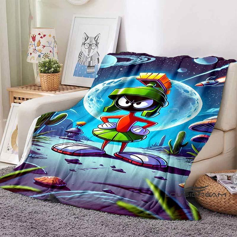 

A classic *Marvin the Martian* printed blanket. Crafted from soft, fluffy flannel, it offers warmth and comfort. Suitable 75x90cm