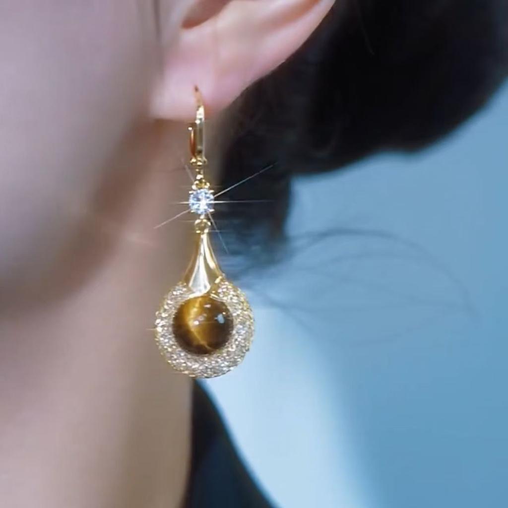 Super Flash Winding Holle Tijgeroog Steen Oorbellen Nieuwe Chinese Stijl Vrouwen Licht Luxe Paleis Stijl Oorbellen Oud