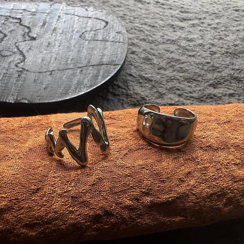 European & American Retro Rock Lava Ring: Hammered Texture, INS Style, Stainless Steel, Trendy Wide Band, Adjustable for Men.