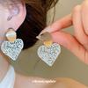 Silver Needle European and American Round Love Hollow Stud Earrings Niche Design Temperament Earrings Light Luxury High-end Exquisite Earrings