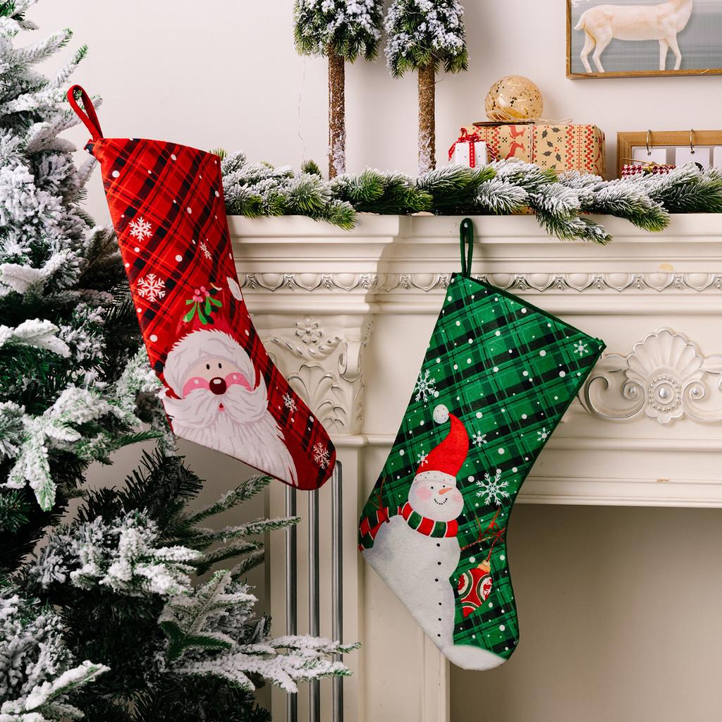 Christmas Playful Stockings In Rich Red And Green Fabric Featuring Snowflakes And Holiday Characters