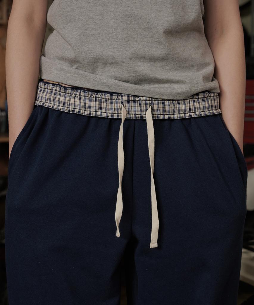 Okkitteu Two-Way Check Pants Navy