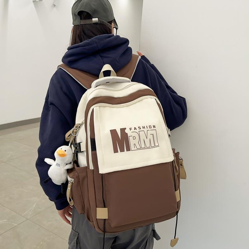 College style large letter color matching student schoolbag spring new large-capacity junior high school backpack