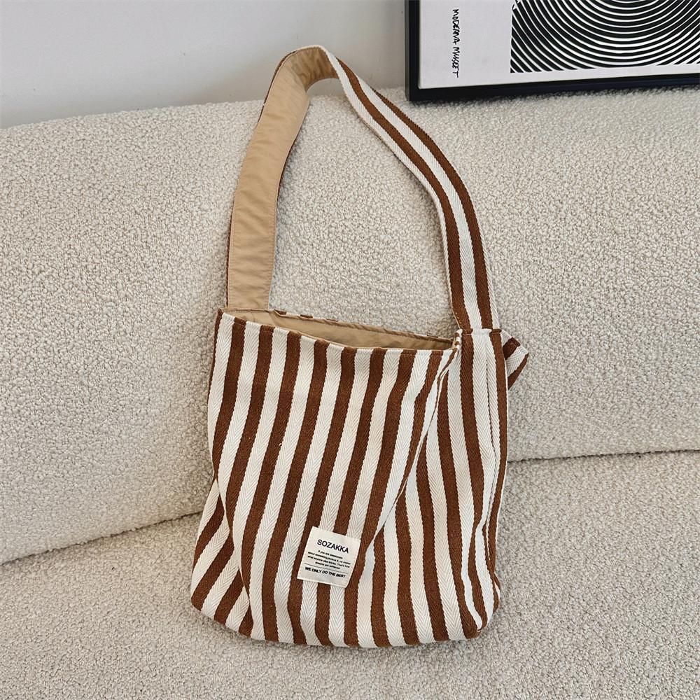 

Stylish Pink Striped Canvas Tote Bag For Women Perfect For Daily Commuting Brown Strap