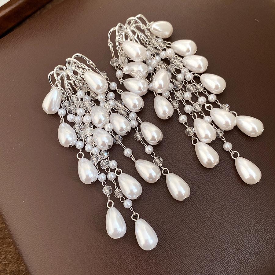 

Silver needle pearl water drop fringed earrings European and American cold wind temperament earrings light luxury high-end earrings