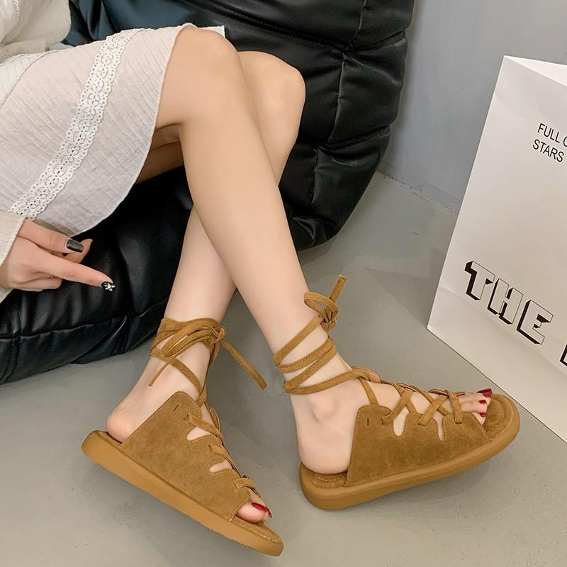

Flat-bottomed cool slippers women s summer new outer wear round head cross strap skirt slippers 40