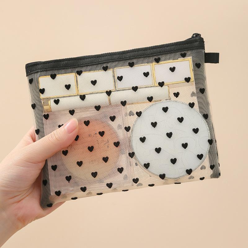 Neue herzförmige Mesh-Make-up-Tasche Tragbare Lippenstift-Make-up-Pinsel-Aufbewahrungstasche Kompaktes visuelles Mesh-Aufbewahrungsbeutel