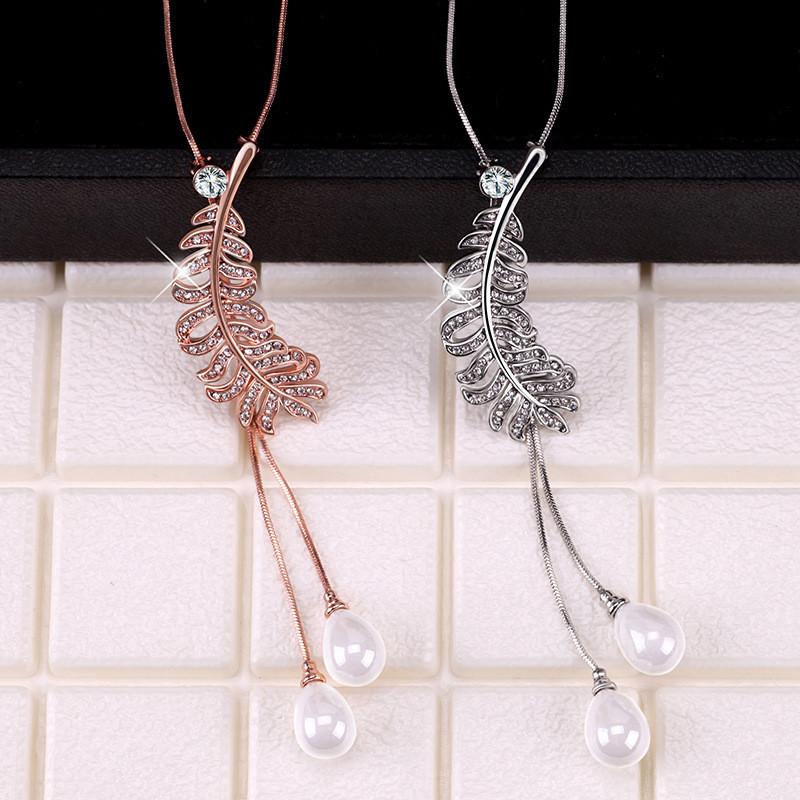 Atemberaubende lange Feder-Perlen-Quasten-Anhänger-Halskette für Frauen in eleganten Stilen