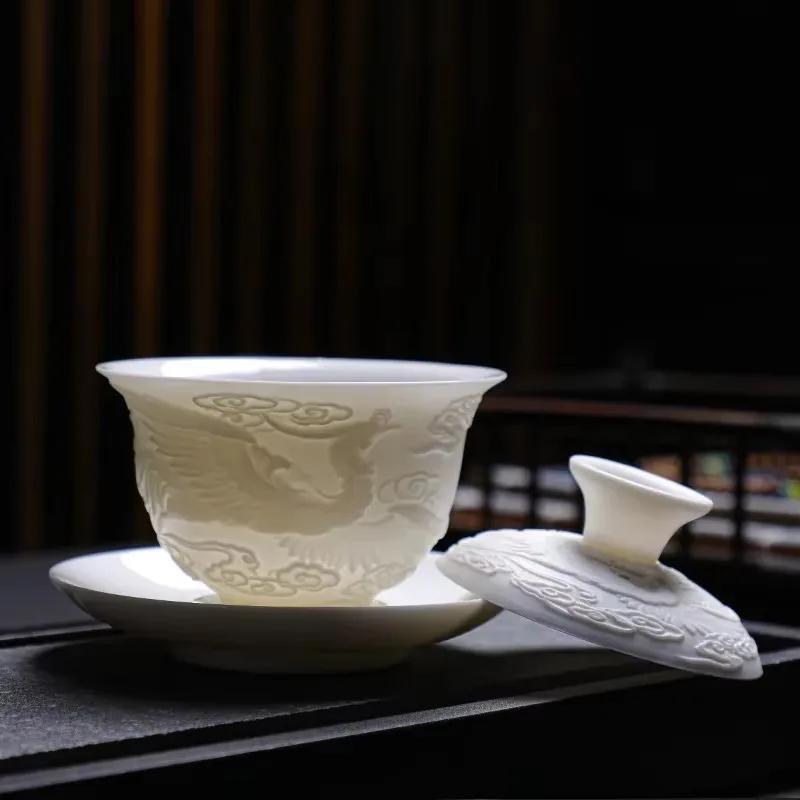 White Porcelain Kung Fu Tea Set White Jade Relief Tureen Ceramic Business Gift Simple Portable Dragon and Phoenix Cups Gaiwan