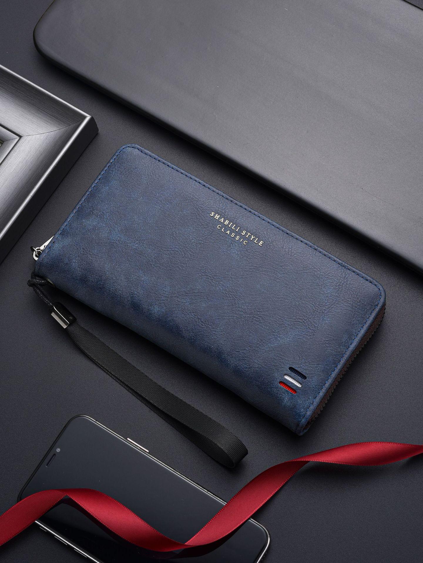 

Мужской кошелек-портмоне на несколько карт 2025 года с отделением для телефона и монетницей синий