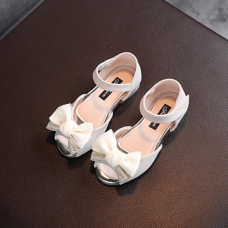 

Children s Sandals Girls Big Bow Hollow Out Princess Shoes New Style Fashion Kids Soft Sole Wedding Flats 31(Insole 18.7CM) бежевый