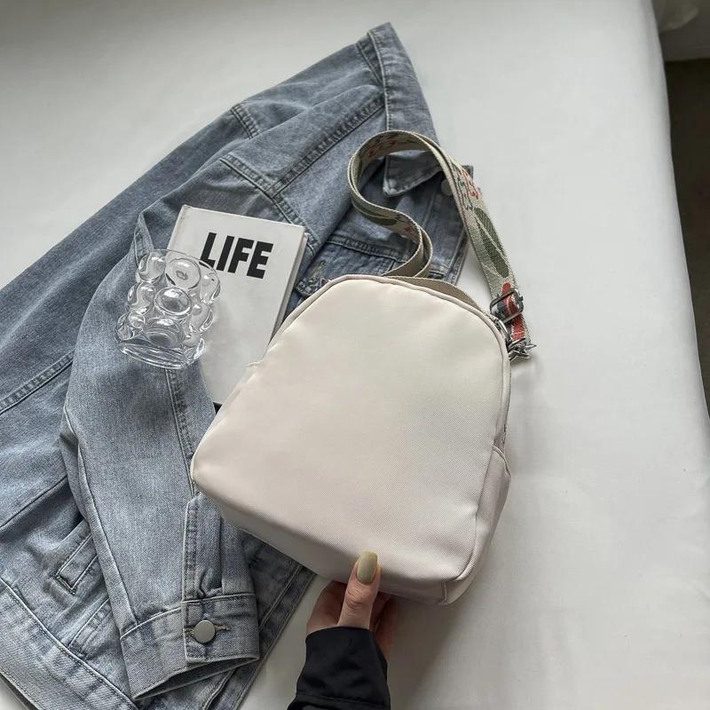 Women's nylon crossbody bag with shoulder strap solid zipper stitching line   fashion
