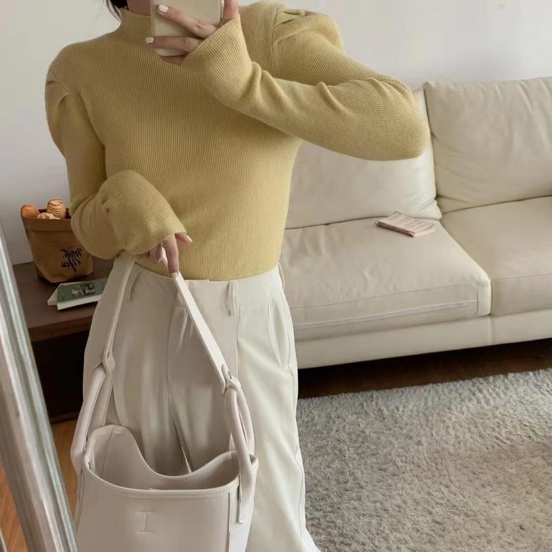 Semi-turtleneck sweater bottoming shirt for women with new autumn and winter design sense slim-fitting bubble long-sleeved knitted sweater for women