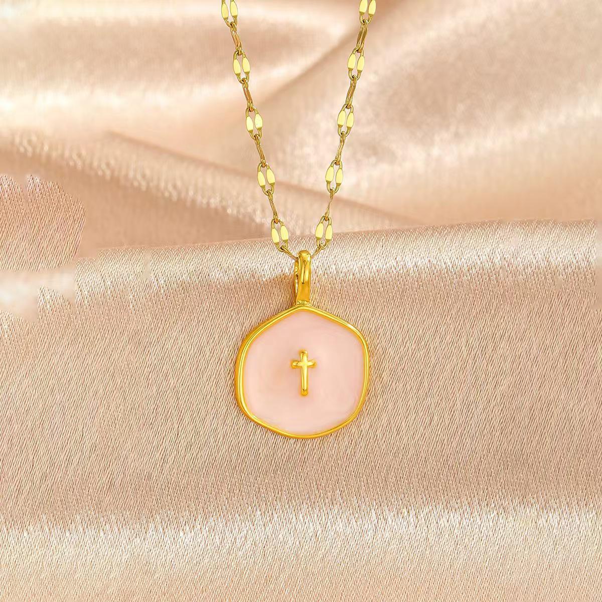 Универсальное колье-подвеска неправильной круглой формы с крестом - Простое, стильное и модное розовый