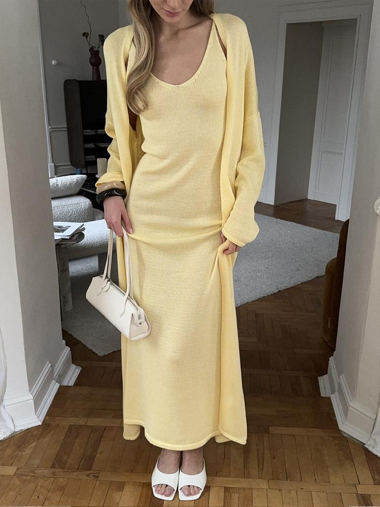 Hot-selling knitted hollow vest long skirt + long-sleeved cardigan set women's soft knitted blouse Europe and America