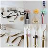 Hot-Selling Multipurpose Toothbrush & Razor Hook – No-Punch Adhesive Bathroom Storage Rack.