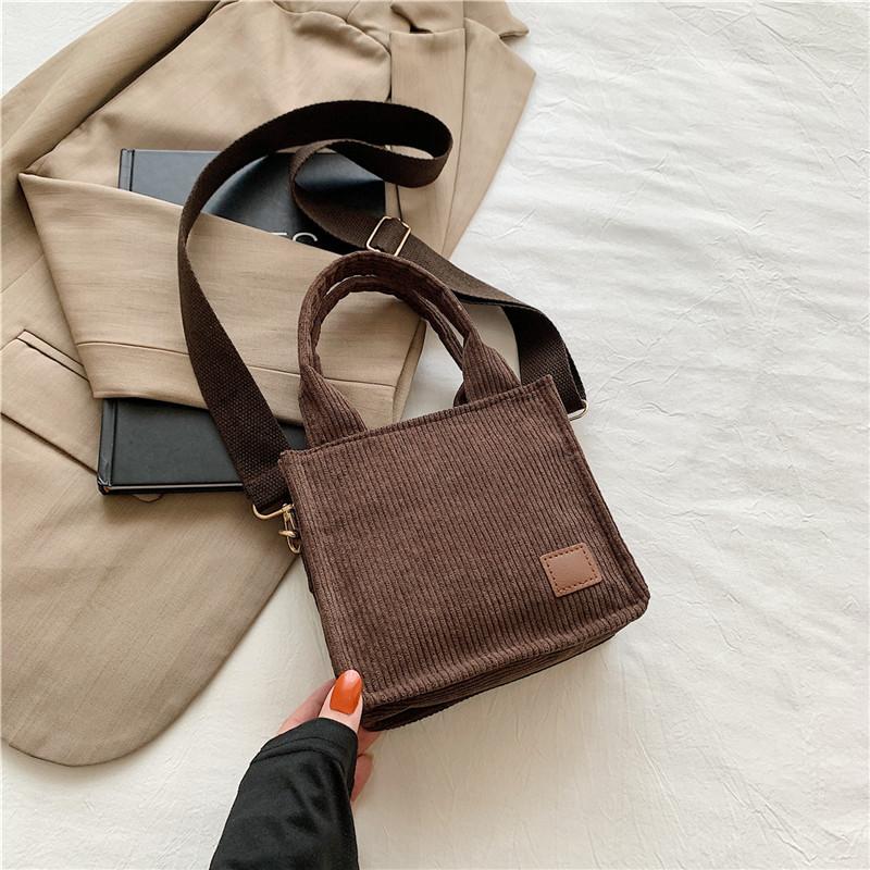 

Solid color simple and fashionable Korean version handbag 2025 spring new versatile ins shoulder messenger bag small square bag women