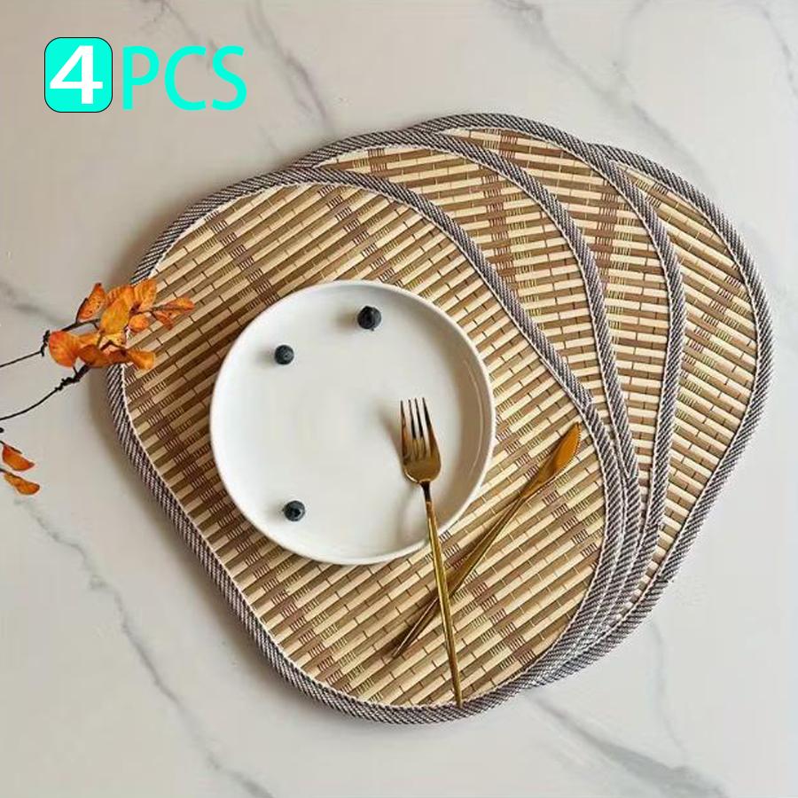 

Simple polished bamboo oval placemat, edged, non-slip, heat-insulating, natural style, suitable for home use as a decorative tableware mat. 4PCS жёлтый