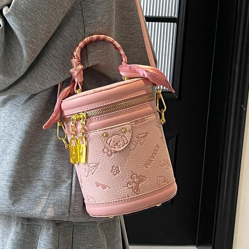 High-quality Cute Embossed Light Luxury High-end Portable Cylinder Bag Niche Design Versatile Temperament Messenger Women's Bag