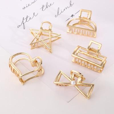 Pinza per capelli a forma di cuore geometrico con artigli per donna