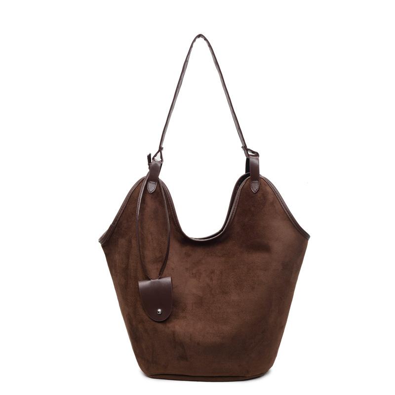 

Large capacity tote bag textured deerskin fleece shoulder bag niche portable bag commuter armpit bag темно-коричневого кольору