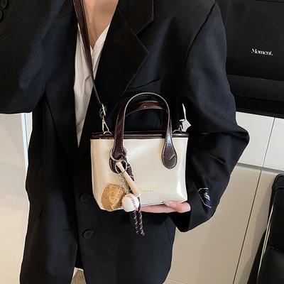 Popular New Fashion Spring Color Matching Texture Portable Tote Messenger Bag with Pendant