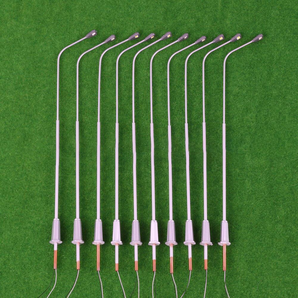 10 Stück. Modelleisenbahnen im O-Maßstab, Metalllichtmasten, verkabelte LED-beleuchtete Straßenlaternen