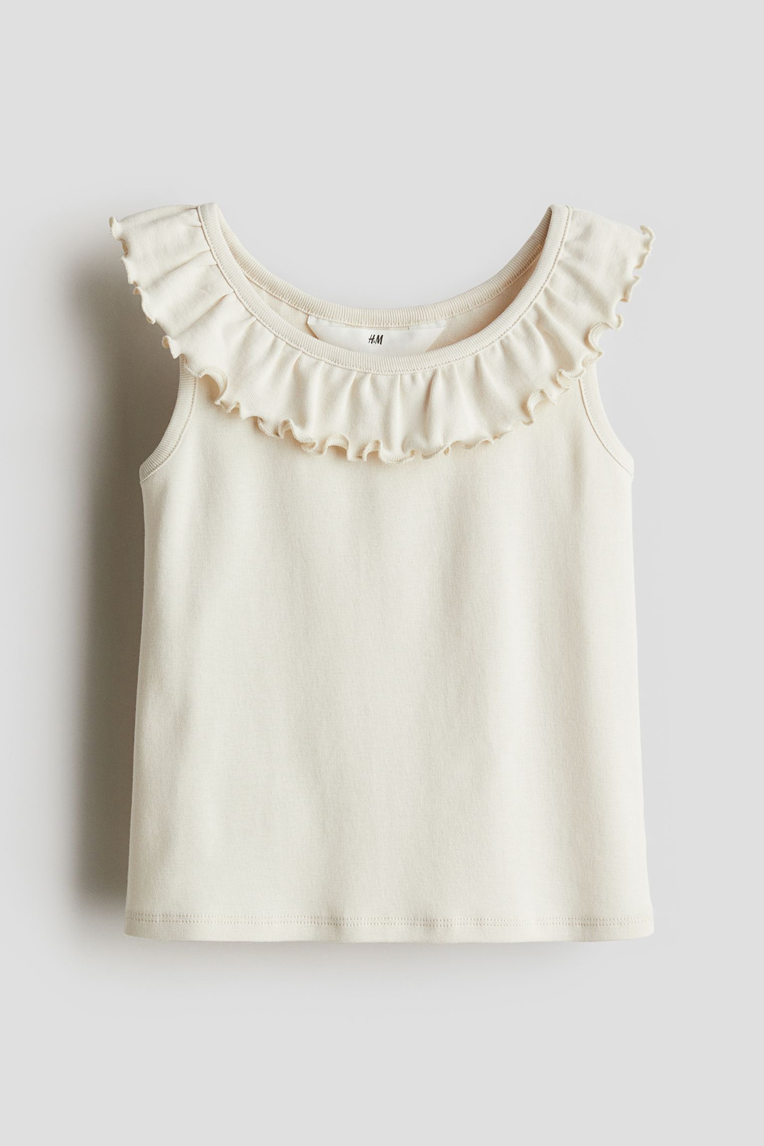 

Топ с воланами