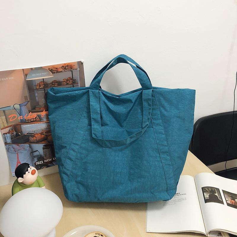 

New retro nylon women s bag washed and old shoulder bag, large-capacity handbag for college students to commute to class озеро синий