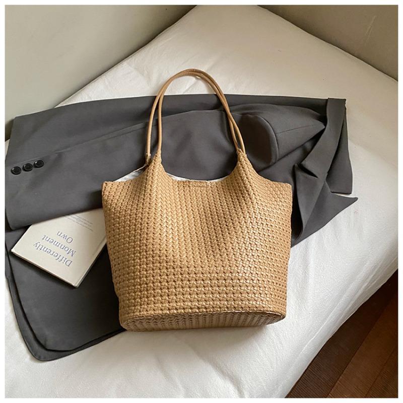 Autumn new texture braided pattern commuting simple large capacity retro solid color bucket armpit shoulder bag for women