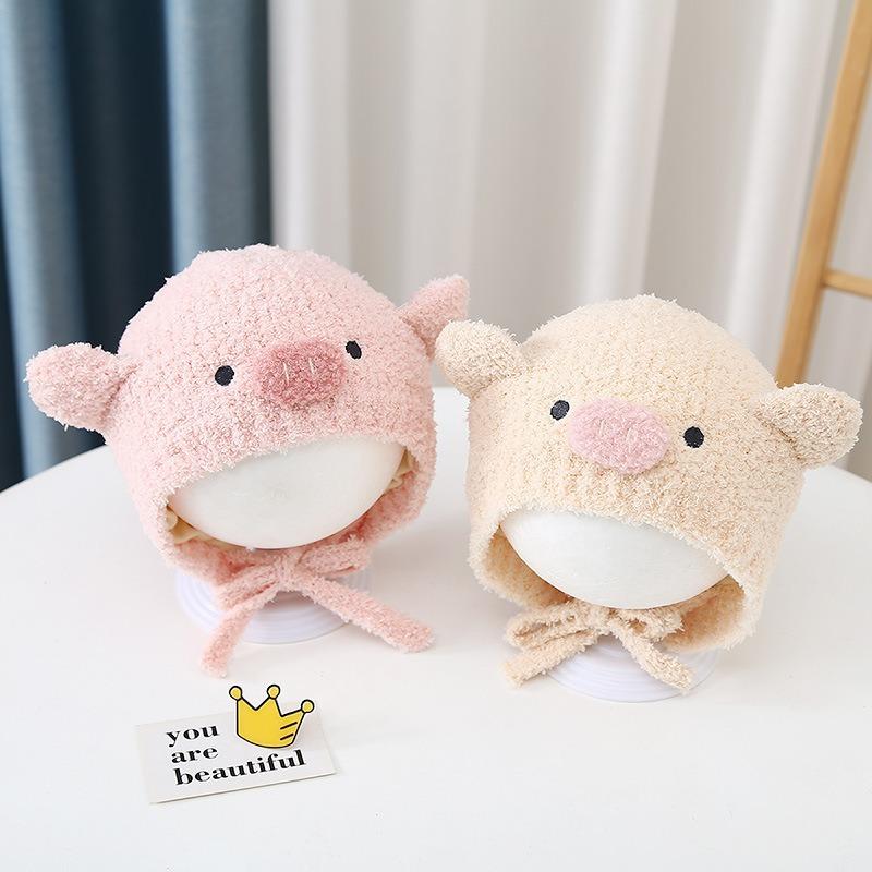 Autumn and winter cute piggy warm men and women children plush hat go out windproof hat baby ear hat baby hat