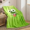 A Playful Green Cartoon Face with Big Eyes, Teeth, and a Sticking-out Tongue. for All Seasons Blanket Lunch Break Throw Gift