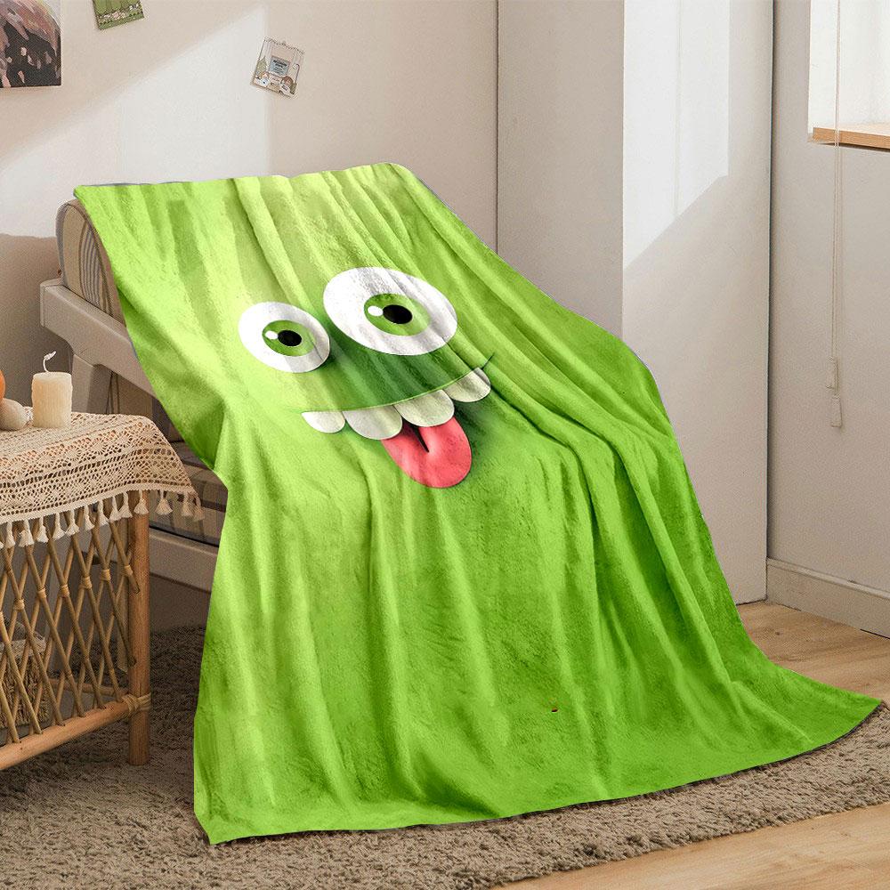 A Playful Green Cartoon Face with Big Eyes, Teeth, and a Sticking-out Tongue. for All Seasons Blanket Lunch Break Throw Gift