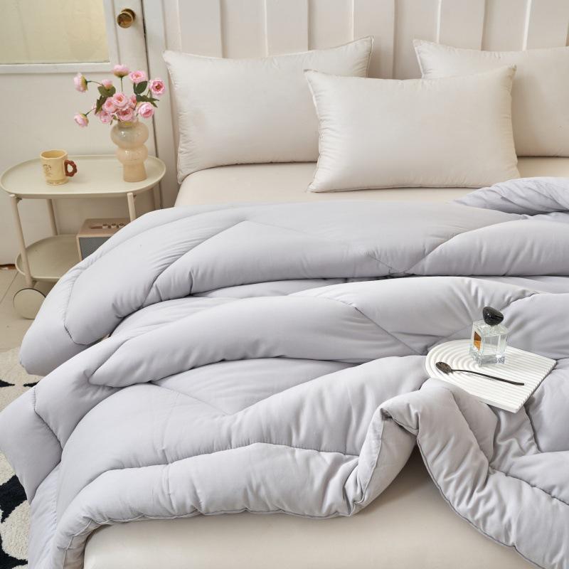 Feather Cotton Quilt: All-Season, Skin-Friendly, Washable, Pure Color, Warm Quilt for Single and Double, Ideal for Dormitory or Home Use.