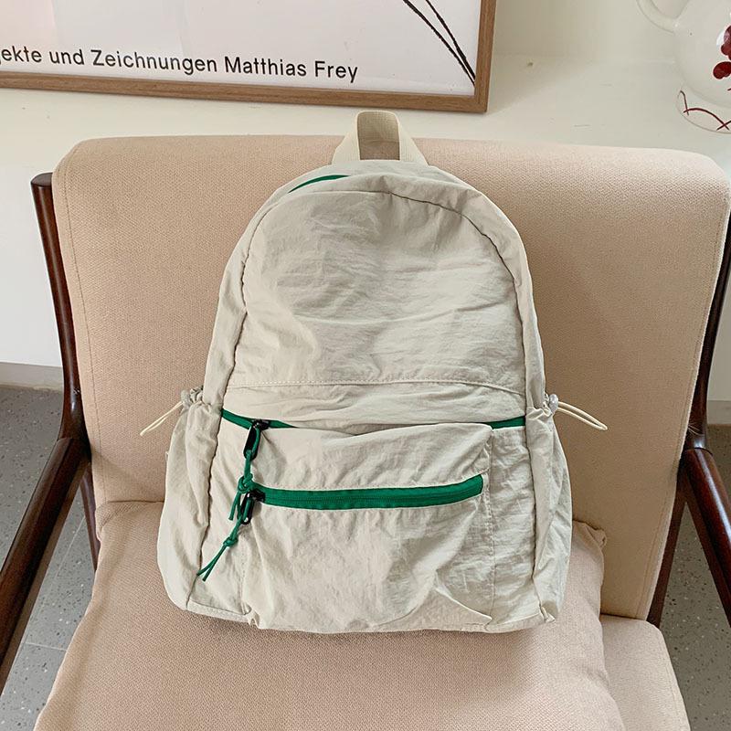 Schoolbag Ultra Light Portable Backpack Commuter Wash Pleated Sense Backpack Leisure Large Capacity Versatile School Bag Women's Travel Bag Tide
